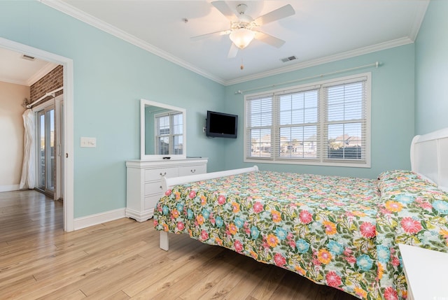 bedroom with ceiling fan, light wood-type flooring, and crown molding