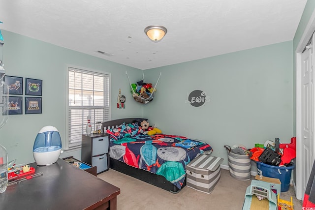 bedroom with visible vents