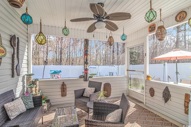 view of patio with ceiling fan, fence, and outdoor lounge area