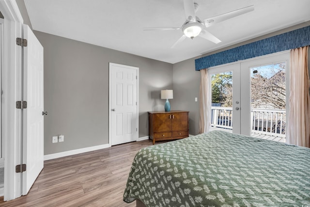 bedroom featuring access to exterior, french doors, hardwood / wood-style flooring, and ceiling fan