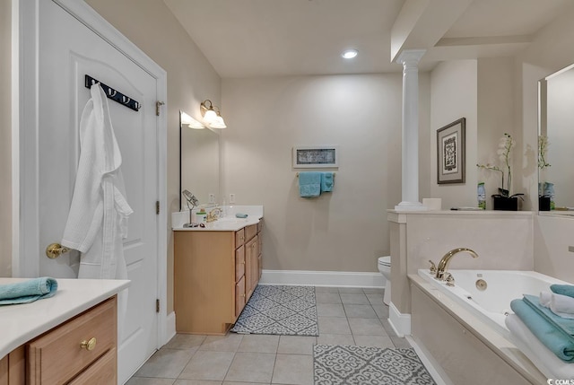 bathroom featuring ornate columns, vanity, tile patterned floors, and toilet