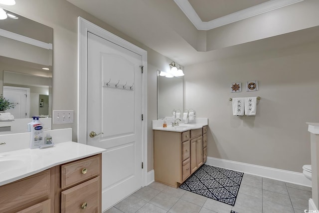 bathroom with vanity, toilet, and tile patterned flooring