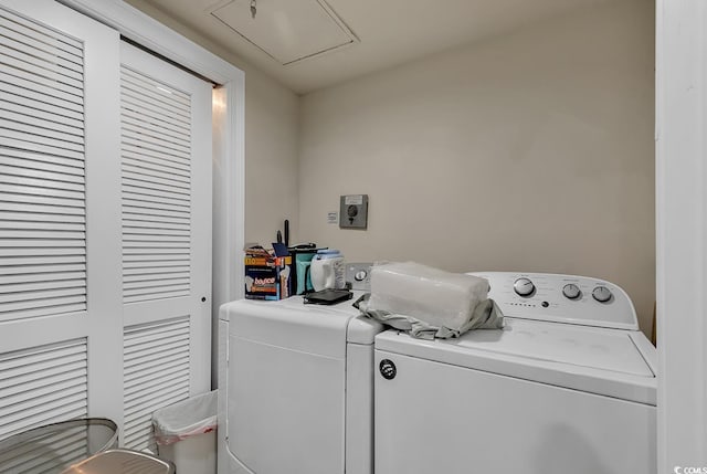 laundry room featuring washing machine and clothes dryer