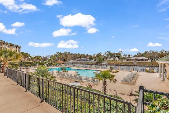 view of pool featuring a patio