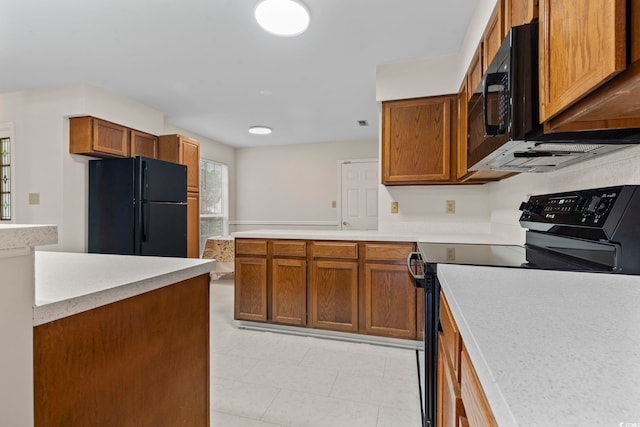 kitchen with black appliances