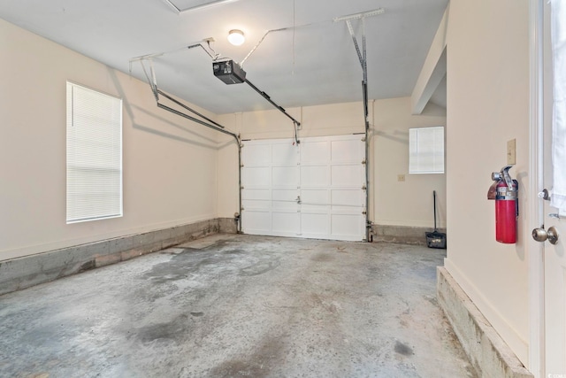 garage featuring a garage door opener