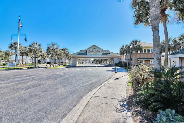 view of street with sidewalks and curbs