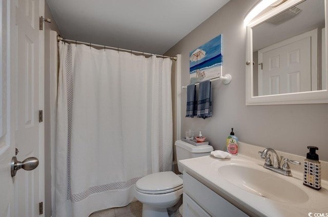 full bath featuring toilet and vanity