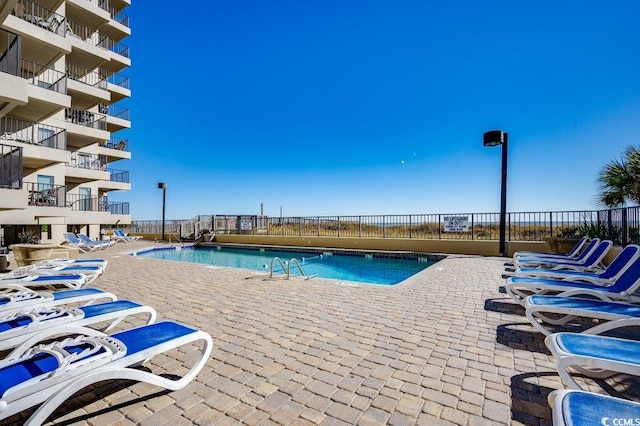 community pool with fence