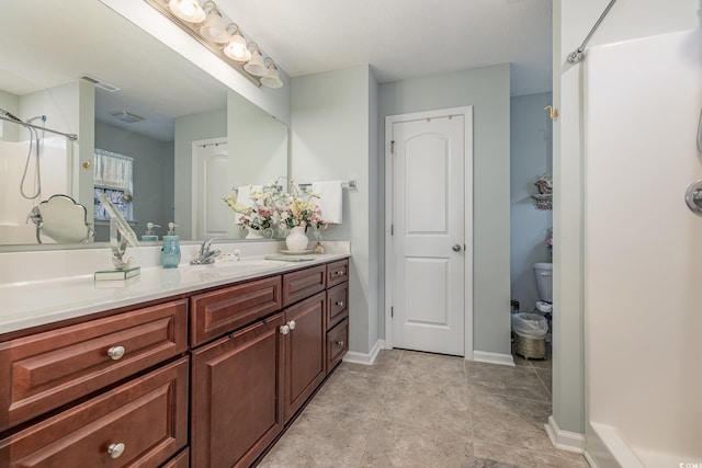 bathroom featuring vanity and walk in shower