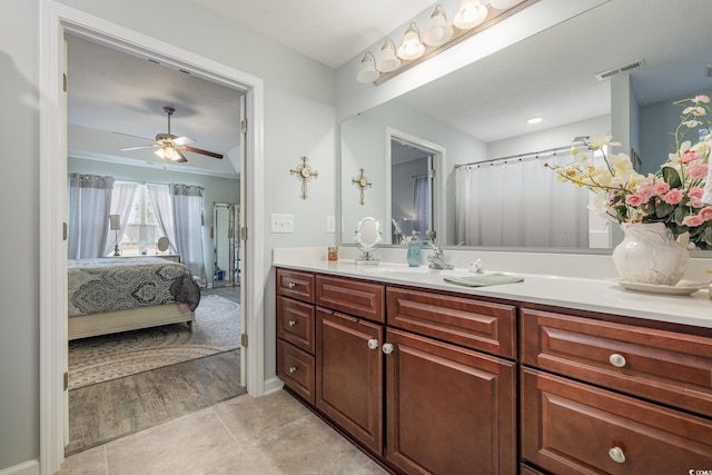 bathroom with vanity, tile patterned floors, and ceiling fan