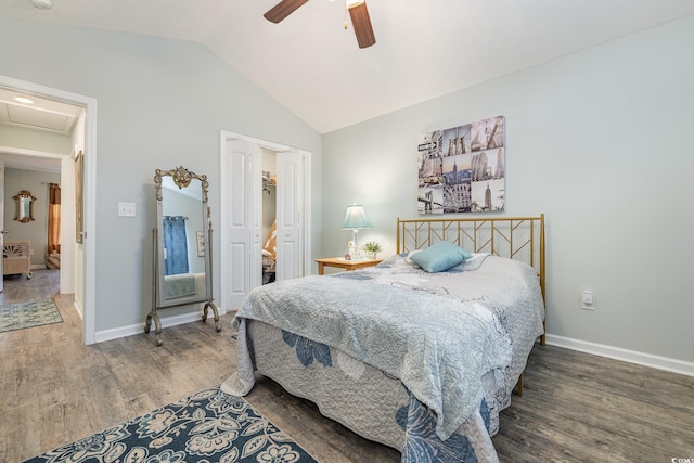 bedroom featuring wood-type flooring, vaulted ceiling, and ceiling fan