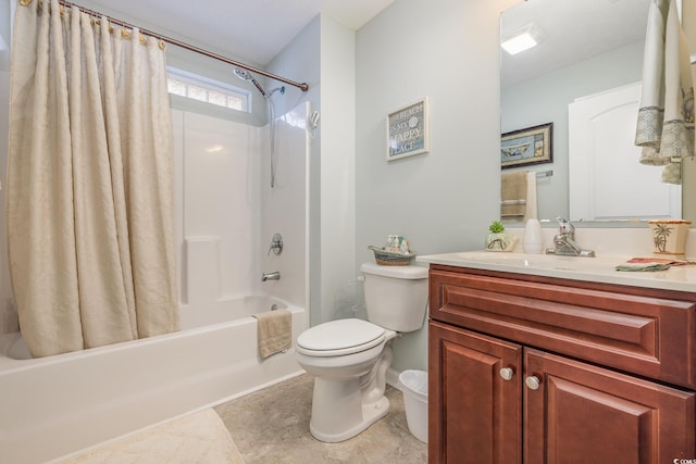 full bathroom featuring shower / bath combination with curtain, vanity, and toilet