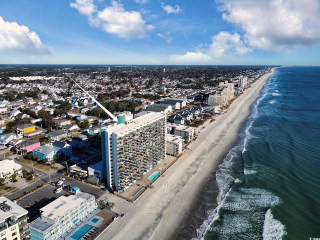 drone / aerial view with a view of the beach and a water view