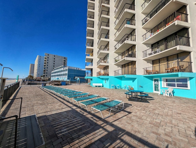 view of swimming pool featuring a patio area