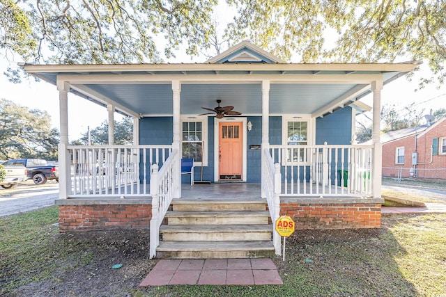 bungalow-style home featuring covered porch and ceiling fan