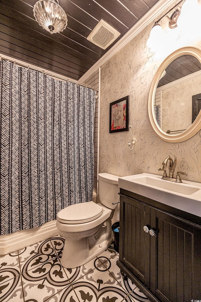 bathroom with toilet, tile patterned floors, wood ceiling, and crown molding