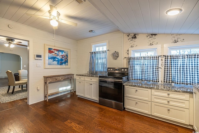 kitchen with dark stone countertops, wooden ceiling, stainless steel range with electric stovetop, dark hardwood / wood-style floors, and lofted ceiling