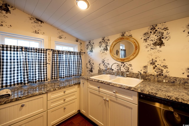 kitchen with wood ceiling, dishwasher, stone counters, sink, and lofted ceiling