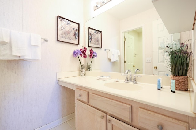 bathroom featuring tile patterned floors and vanity