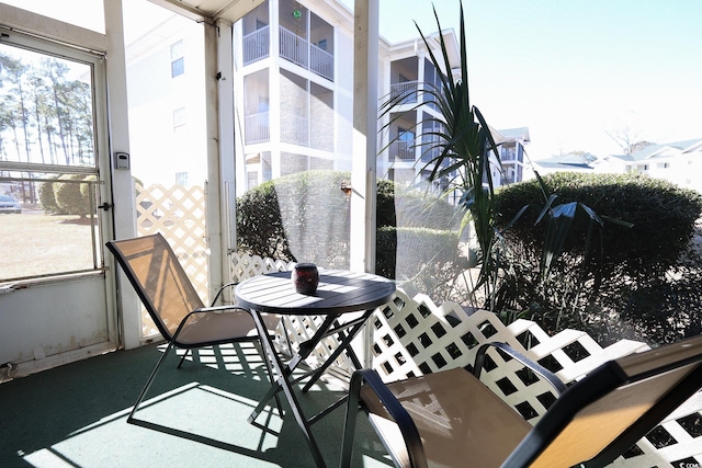 sunroom featuring a healthy amount of sunlight