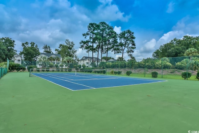 view of sport court featuring basketball hoop