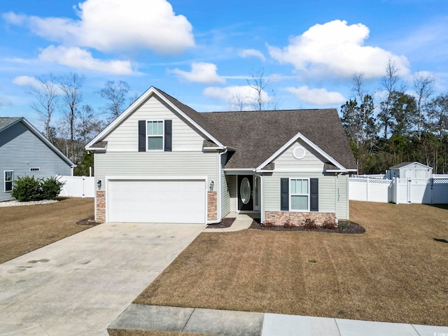 view of front of home with a garage and a front lawn