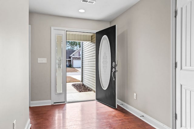 entryway featuring dark wood-type flooring