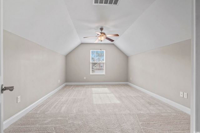 bonus room with light carpet, ceiling fan, and lofted ceiling