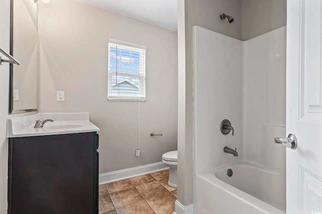 full bathroom with tile patterned floors, vanity, shower / bath combination, and toilet