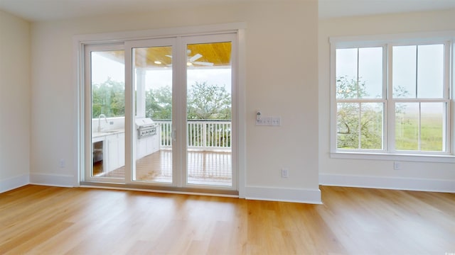48 Furman Ln, Pawleys Island, SC 29585 - entryway with baseboards and light wood-style flooring