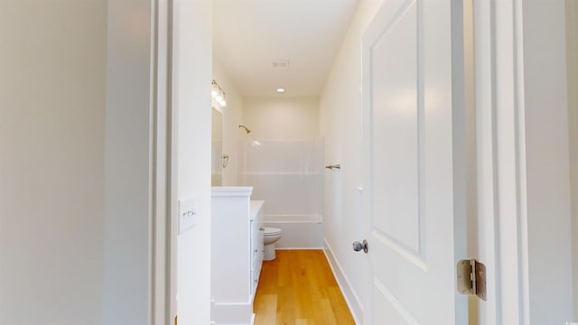 48 Furman Ln, Pawleys Island, SC 29585 - full bathroom featuring wood finished floors, vanity, and shower / washtub combination