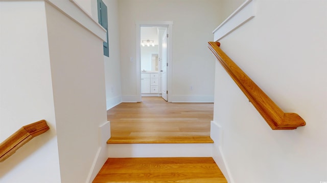 48 Furman Ln, Pawleys Island, SC 29585 - staircase with wood finished floors and baseboards