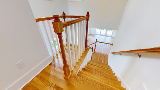 48 Furman Ln, Pawleys Island, SC 29585 - stairway featuring wood finished floors and healthy amount of natural light