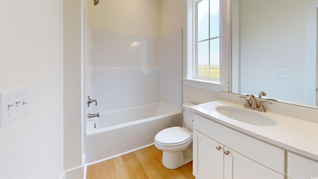 48 Furman Ln, Pawleys Island, SC 29585 - full bath with vanity, wood finished floors, and shower / tub combination