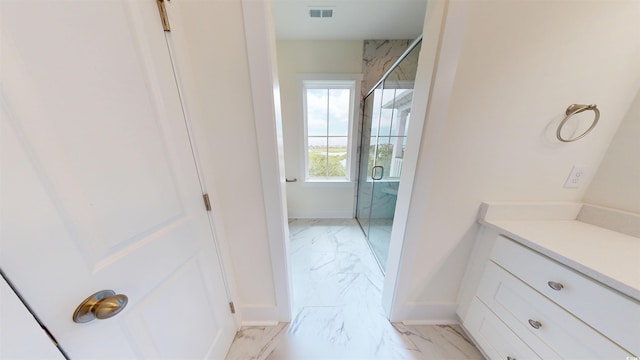48 Furman Ln, Pawleys Island, SC 29585 - bathroom featuring marble finish flooring, a marble finish shower, and vanity