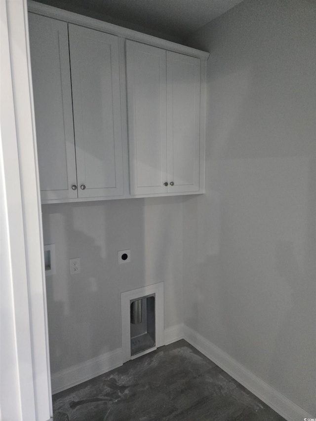 washroom with cabinets, electric dryer hookup, and washer hookup