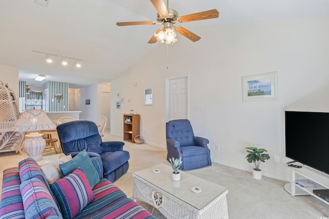 living room featuring ceiling fan, light carpet, track lighting, and vaulted ceiling