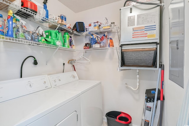 laundry room featuring washer and dryer and electric panel