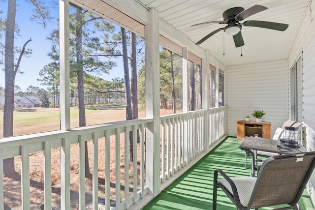 sunroom / solarium with ceiling fan and plenty of natural light