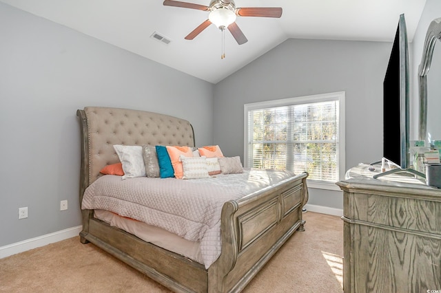 carpeted bedroom featuring ceiling fan and lofted ceiling