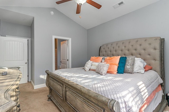 bedroom featuring ceiling fan, light colored carpet, and vaulted ceiling