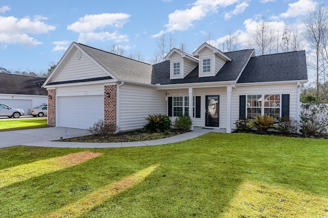 view of front of home featuring a garage and a front lawn