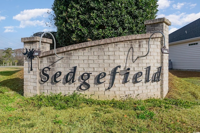 view of community sign