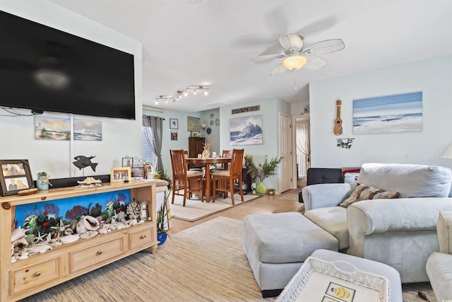 living room with ceiling fan