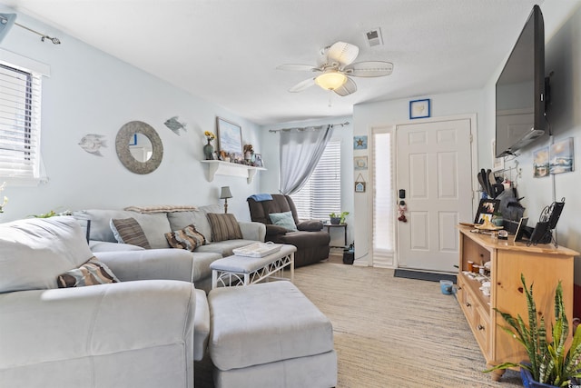 living room with ceiling fan