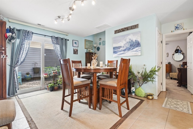 view of tiled dining space