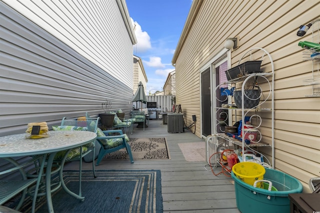 wooden terrace featuring central AC