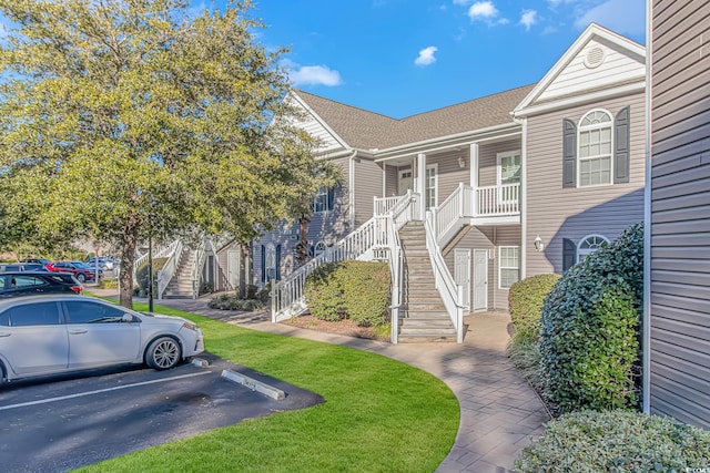 view of front of property featuring covered porch