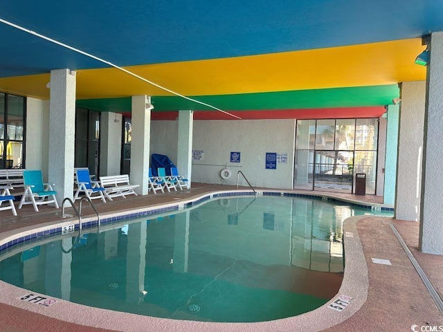 view of pool with a patio